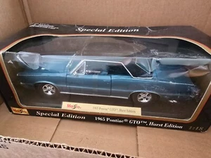 MAISTO 1965 PONTIAC GTO HURST EDITION SPECIAL EDITION MASSSTAB 1:18 *NEU* - Bild 1 von 5