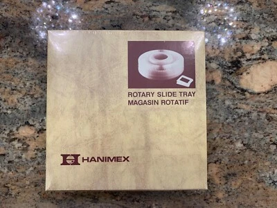 Bandeja deslizante giratoria Hanimex vintage tiene capacidad para 100 2 x2 diapositivas nueva en caja  Foto 1 de 4