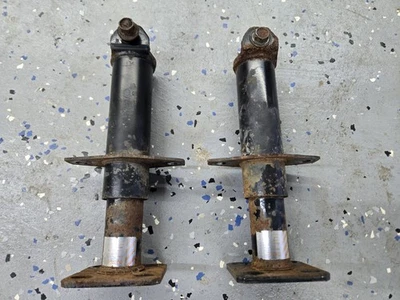 Par de amortiguadores de parachoques trasero 84-89 Nissan 300ZX Z31 OEM L & R Foto 1 de 4