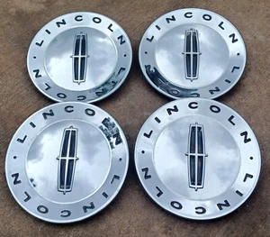Lincoln Navigator center cap set of 4, chrome, 2002-2008 p/n 2L7J 1A096 AB - Picture 1 of 3