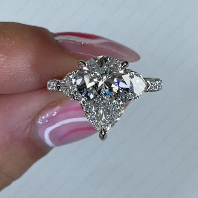 Помолвочное кольцо с 3 камнями муассанит груши и сердца 6,69 TCW покрытие белым золотом 14 карат - Изображение 1 из 4