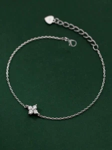 Prong Set 0.25 CT White Sapphire With Single Four Leaf Flower Women's Bracelet - Picture 1 of 9