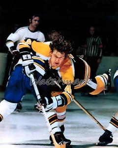 NHL Bobby Orr Boston Bruins Taking a Hip Check Color Game Action 8 X 10 Photo - Picture 1 of 1