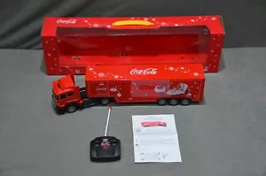 Große 50cm Coca Cola Weihnachts-LKW Fernbedienung Frontleuchten Weihnachtsmann im Karton - Bild 1 von 12