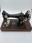 ANTIQUE 1919 SINGER SEWING MACHINE WITH CARRYING CASE AND MANY ATTACHMENTS