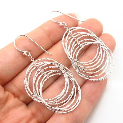 Pendientes colgantes de plata de ley 925 entrelazados con diseño de varios círculos Foto 1 de 3