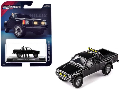 Toyota Hilux SR5 1985 camioneta pickup negra serie "colección" modelo diecast 1/64  Foto 1 de 3