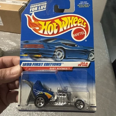 Babyboomer Hot Wheels 1999 primera edición cromo y azul con llamas amarillas T11 Foto 1 de 4