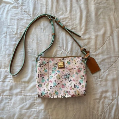 Bandolera Dooney & Bourke Epcot Festival Internacional de Flores y Jardines 2020 Foto 1 de 4