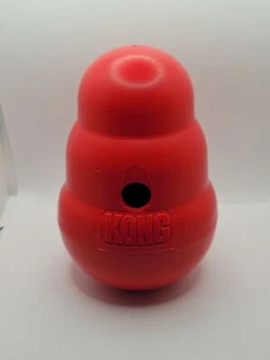 Dispensador de alimentos y golosinas KONG Wobbler juguete para perros tamaño grande peso 7,5" de alto Foto 1 de 4
