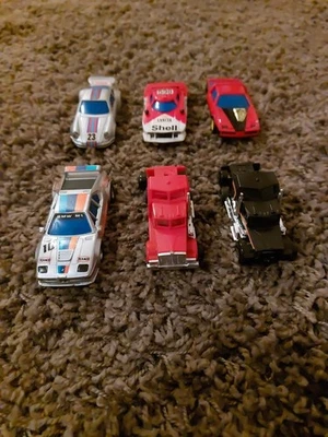 Vintage Rennbahn Autos | Porsche 23 • Shell Lancia • BMW M1 & co für Sammler - Bild 1 von 4