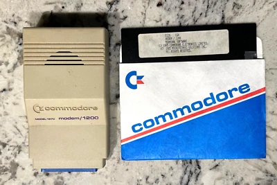 Módem vintage COMMODORE 64/128 SX64 Vic 20 modelo 1200 1670 con disquete OEM 5,25" Foto 1 de 4