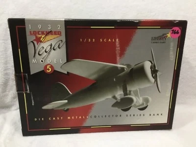 RACING CHAMPIONS 1932 LOCKEED VEGA MODEL 5 DIE CAST AIRPLANE BANK 1/32  - Image 1 of 4