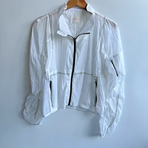 Chaqueta cortavientos FP Movement para mujer mediana Free People empacable blanca acanalada - Imagen 1 de 14