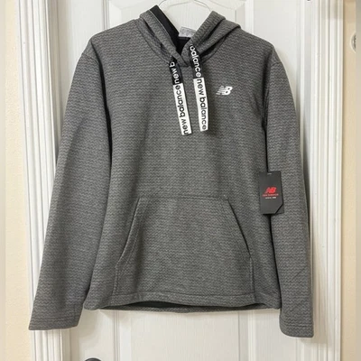 Sudadera con capucha New Balance gris carbón con logotipo talla S Foto 1 de 4