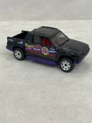 Camioneta pickup Matchbox Hero City #40 Ford Explorer Sport Trac negra piezas de automóviles casi nueva Foto 1 de 4