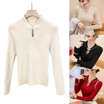 Sophisticated Women's Slim Turtleneck Sweater with Unique Disc Button Detail - Image 1 of 4