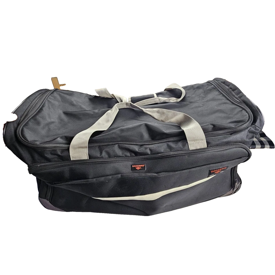 Bolso de Lona Dockers con Ruedas Rodantes Negro con Correas Grises 32 por 15 por 13 Foto 1 de 4