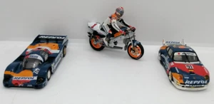 2 diecast 1:43 Rare Le Mans Repsol Porsche 956(Quartzo)/ 911 GT2(Vitesse) + Bike - Picture 1 of 8