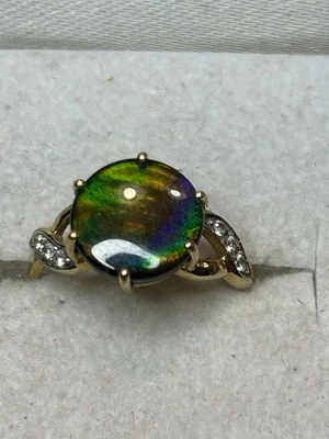 Anillo Ammolita y Zafiro Blanco en Oro Amarillo Foto 1 de 4