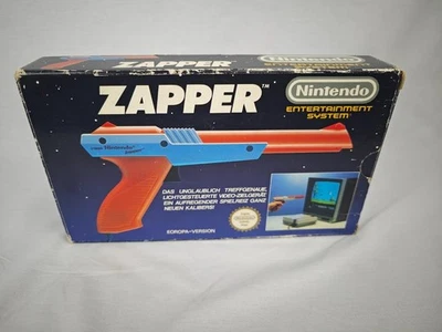 Sistema de entretenimiento Nintendo / NES: pistola de luz Zapper en embalaje original - Imagen 1 de 4