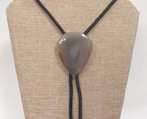 VTG 1970s POLISHED STONE GLASS ? SLIDE BOLO TIE BLACK LEATHER SILVER METAL TIPS - Picture 1 of 11