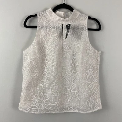 Top sin mangas con cuello falso Outlet del mercado negro de la Casa Blanca talla 6 encaje blanco Foto 1 de 4