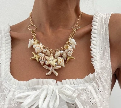 Collar concha marina gruesa joyería de playa en capas perlas blancas doradas estrellas de mar Foto 1 de 4