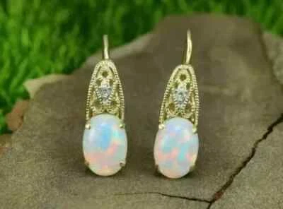 Pendiente de boda aro ópalo de fuego creado en laboratorio corte ovalado de 2,3 quilates enchapado en oro amarillo de 14 quilates Foto 1 de 4