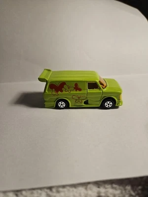 Furgoneta diecast verde lima sin marca con Butterfly 'S On Sides Foto 1 de 4
