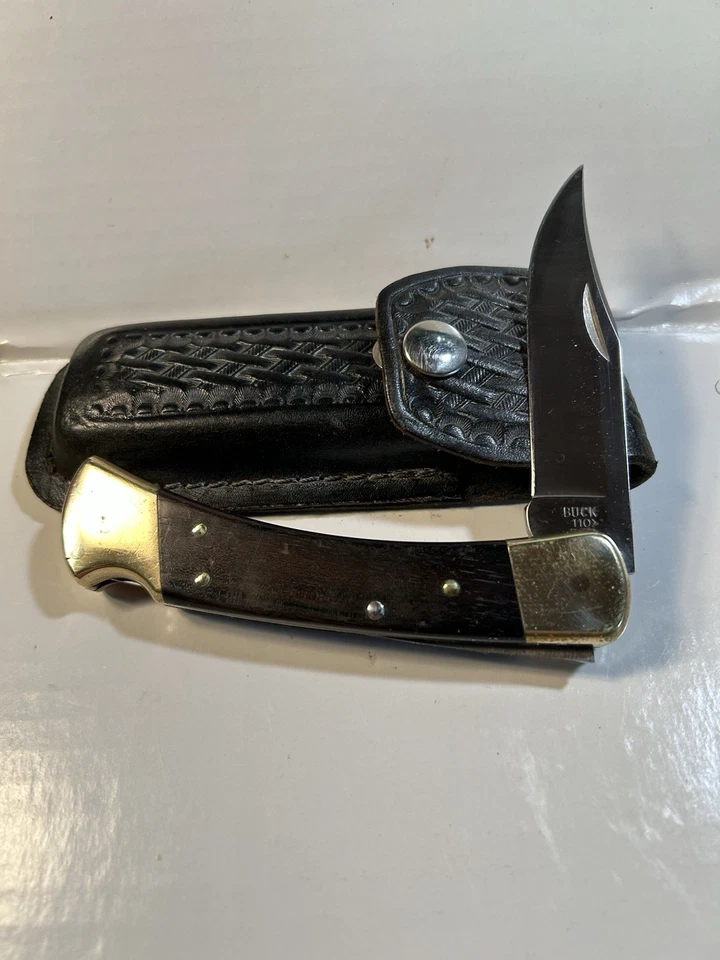 Buck 110 USA EBONY Hunting Folding Pocket KNIFE Lockback W/Leather Sheath - Image 1 of 4