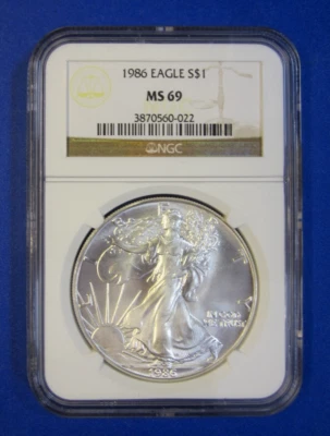 1986 $1 American Silver Eagle~ NGC Brown Label Certified MS69~ First Year Minted - Image 1 of 2