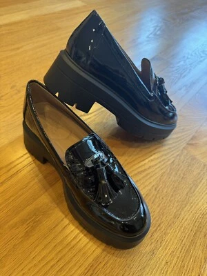 Mocasín de moda naturalizer para mujer Foto 1 de 4