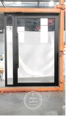 Glass Aluminum Pivot door 72" Wide x 96" High - Image 1 of 4
