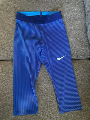 Nuevas mallas Nike Pro Elite Atletismo 3/4 azules AO8495-000 para mujer talla pequeña” Foto 1 de 4