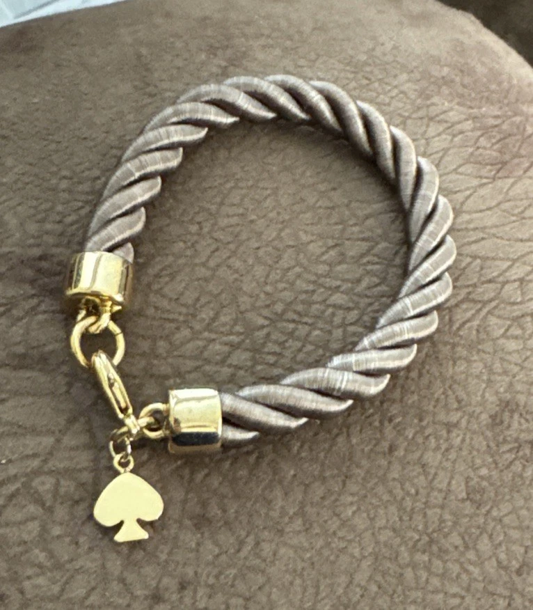 Pulsera Kate Spade tela/metal dorado Foto 1 de 3