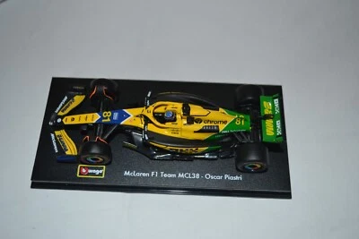 Burago Maßstab 1:43 F1 MCLAREN MCL38 2024 mit Helm Piastri Senna Lackierung - Bild 1 von 3