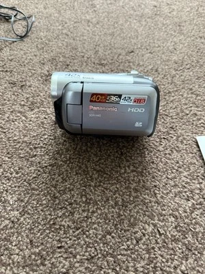 Panasonic SD Card/hard Disk Video Camera  Instructions, Battery Charger & Cables - Image 1 of 4