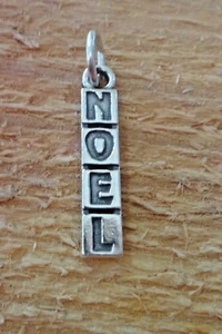 Sterling Silver 23x5mm Holiday Christmas says NOEL Charm - Picture 1 of 3