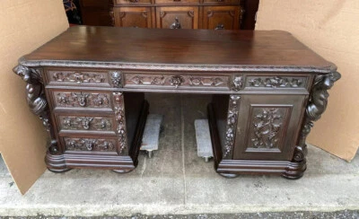 ESCRITORIO FIGURATIVO SOCIOS CAOBA TALLADA R. J. HORNER Foto 1 de 4