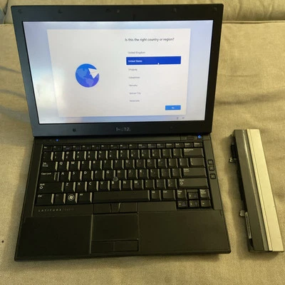 Laptop Dell Latitude E4310 con batería y cargador adicionales Foto 1 de 4