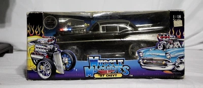 MUSCLE MACHINES 1:18 '57 Chevy Black Die Cast Real Steel Fuel Lines Boxed - Image 1 of 4