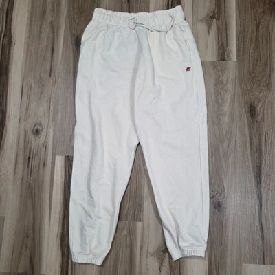 Pantalones deportivos New Balance Core ocio beige hechos en EE. UU. grandes Foto 1 de 4