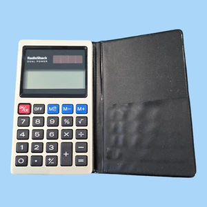 ¡PROBADO Y FUNCIONANDO! Calculadora solar de doble potencia Radio Shack EC-458 con estuche - Imagen 1 de 8