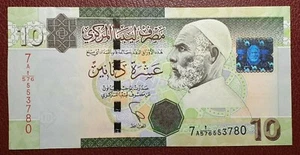 LIBIA LIBYA 10 DINARES 10 DINARS (2011) P-78 SERIE 7A DOBLEZ CENTRAL EBC - Foto 1 di 2