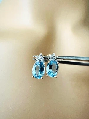 Aretes Estate de oro amarillo de 14 quilates con detalles de diamantes y aguamarina Foto 1 de 4