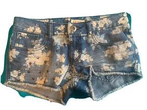 Pantalones cortos con flores fangosas talla 0 con corte brillante nuevos sin etiquetas - Imagen 1 de 3
