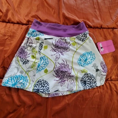 NUEVO CON ETIQUETAS 🏃Faldas para Correr Floral Skort Talla 0 XS (Adolescente 12-16) Púrpura Sweatwick 90/10 Foto 1 de 4