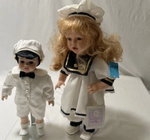 Pair boy & girl bisque porcelain 12" and 15" sailor dolls. - Picture 1 of 9