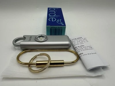 SHE'S BIRDIE Birdie The Original Personal Safety Alarm 130db Bright Strobe Metallic Silver